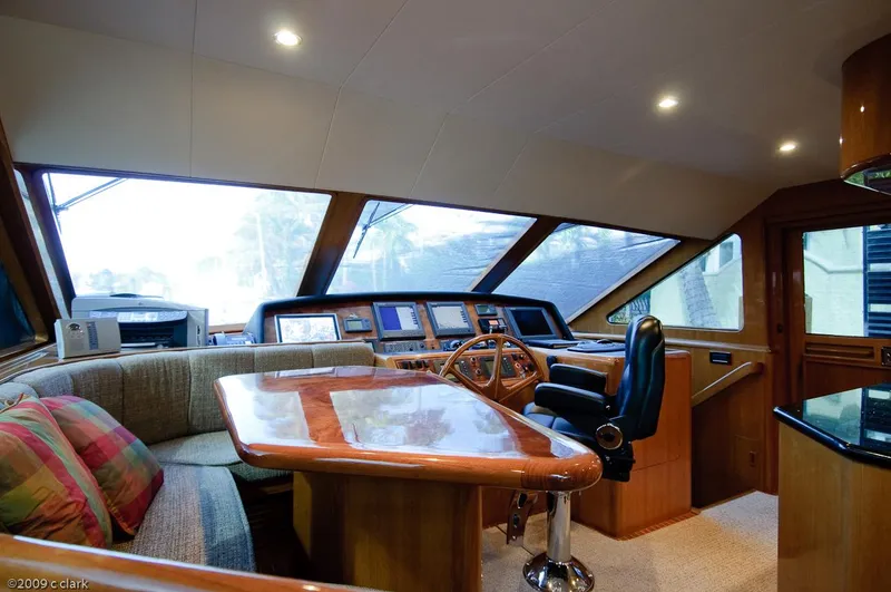 Slide: The Image of Luxurious interior of 2005 Ocean Alexander 58 Motoryacht with helm and seating area. - 15