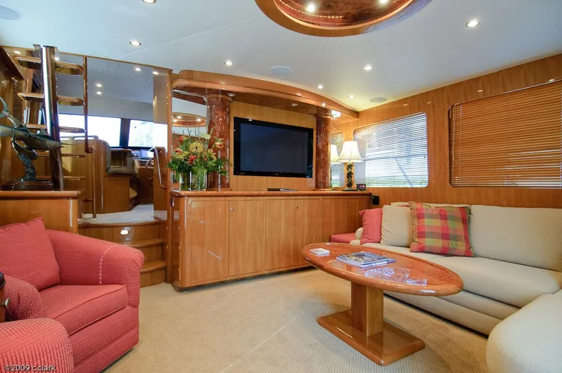 Slide: The Image of Luxurious interior of 2005 Ocean Alexander 58 Motoryacht with elegant wood finishes and cozy seating. - 2