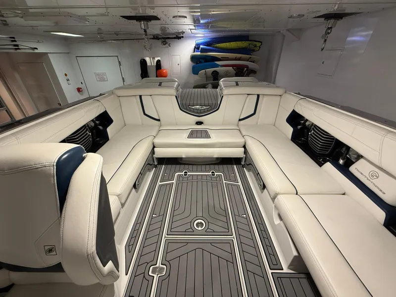 Slide: The Image of 2020 Nautique Super Air G23 interior with luxurious seating and modern design. - 12