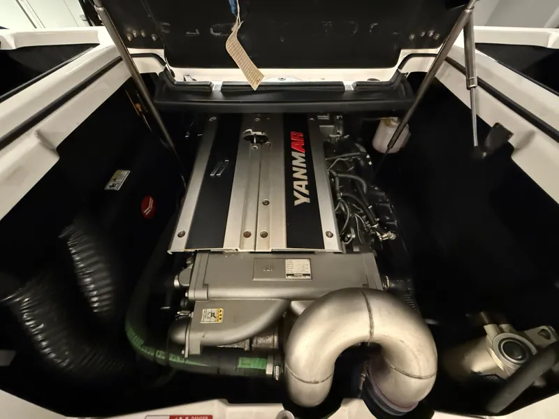 Slide: The Image of 2020 Nautique Super Air G23 engine compartment with Yanmar engine. - 13