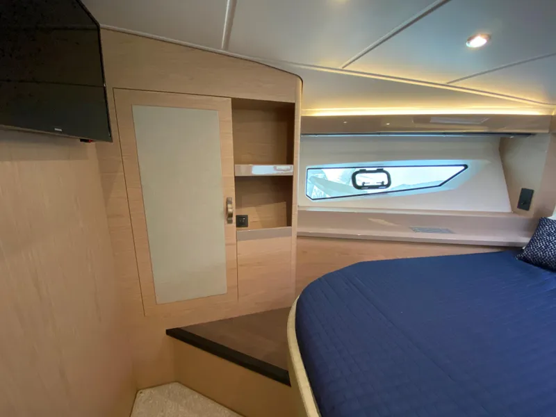 Slide: The Image of Interior cabin of 2020 Beneteau Gran Turismo 50 Sportfly with modern design and window view. - 19
