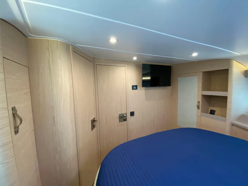 Slide: The Image of Interior cabin of 2020 Beneteau Gran Turismo 50 Sportfly with modern wood finish. - 21