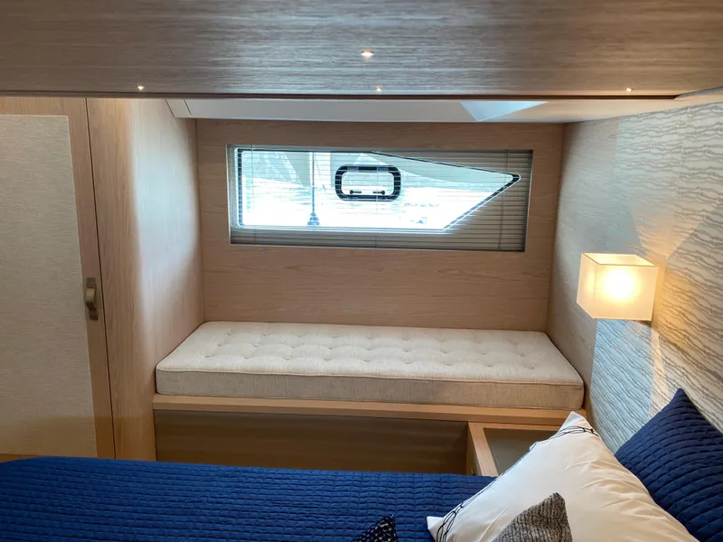 Slide: The Image of Interior cabin of 2020 Beneteau Gran Turismo 50 Sportfly with window and seating. - 33