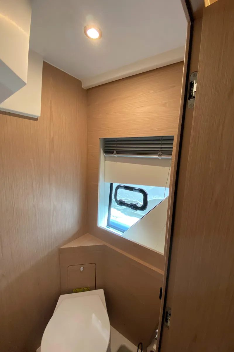 Slide: The Image of 2020 Beneteau Gran Turismo 50 Sportfly bathroom with modern design and natural lighting. - 38