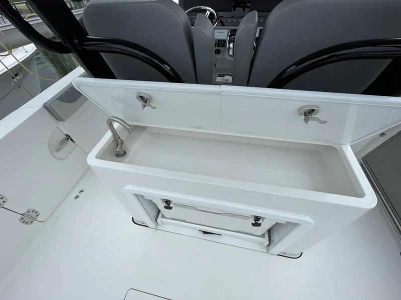Slide: The Image of Sea Pro 320 DLX Dealer Demo- Cockpit Storage - 16