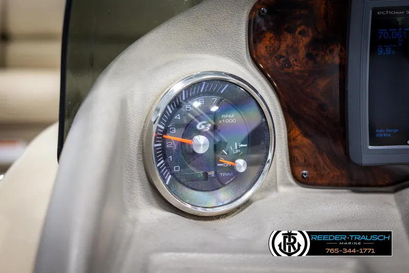 Slide: The Image of Close-up of 2014 SunCatcher Elite 324 boat dashboard with tachometer gauge. - 28