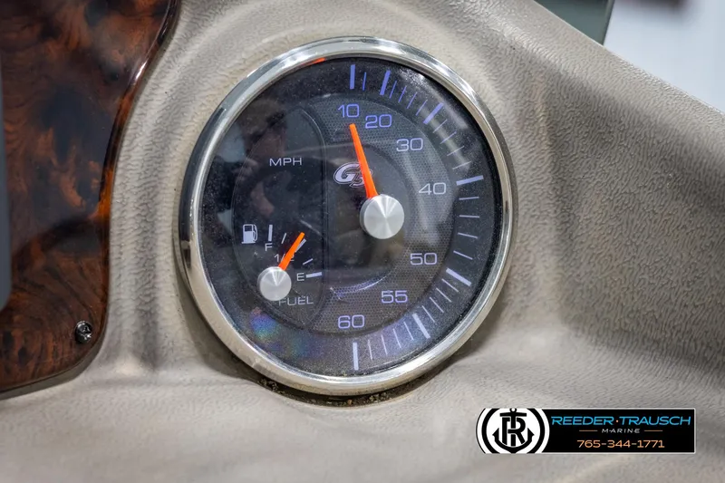 Slide: The Image of Speedometer and fuel gauge of 2014 SunCatcher Elite 324 boat dashboard. - 31