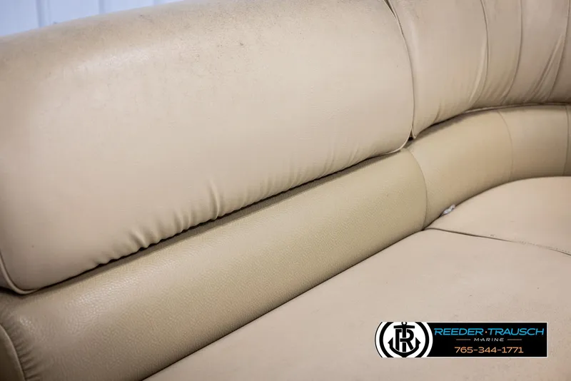 Slide: The Image of Beige leather seating in 2014 SunCatcher Elite 324 boat interior. - 37