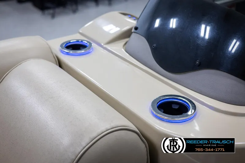 Slide: The Image of 2014 SunCatcher Elite 324 boat interior with illuminated cup holders. - 41