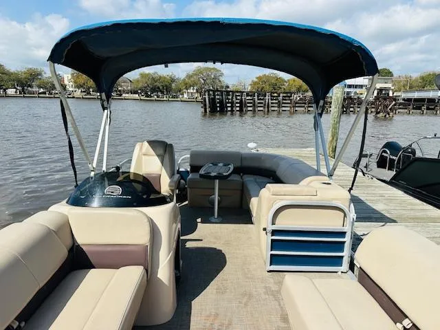 Slide: The Image of 2019 Sun Tracker Party Barge 20 DLX pontoon boat with canopy on a calm river. - 14