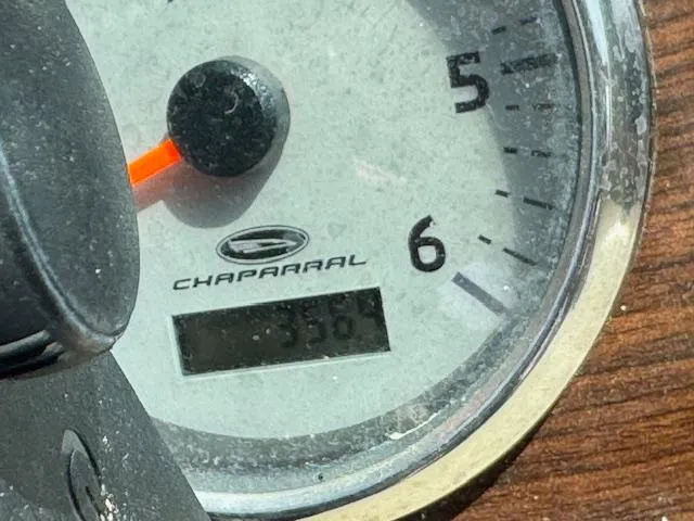 Slide: The Image of Close-up of a 2007 Chaparral 204SSI boat gauge displaying 350 hours. - 10