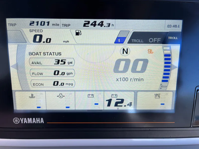 Slide: The Image of Yamaha boat display showing trip data and fuel status for 2019 Grady-White 251 Coastal Explorer. - 13