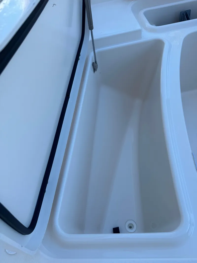 Slide: The Image of 2019 Grady-White 251 Coastal Explorer boat with Yamaha 300 engine docked at marina. - 15