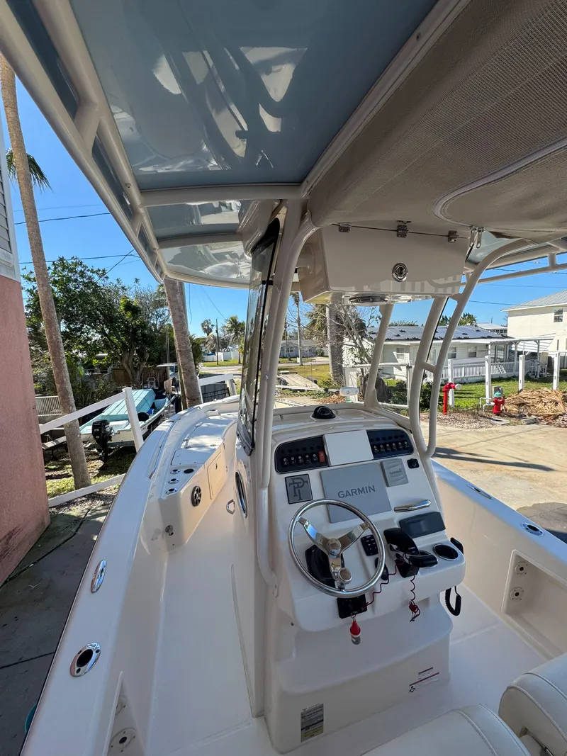 Slide: The Image of 2019 Grady-White 251 Coastal Explorer boat interior with Garmin navigation system. - 5