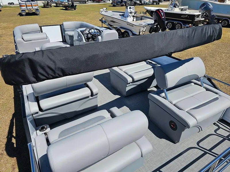Slide: The Image of 2025 Bentley Pontoons LEGACY 243 QUAD SWINGBACK with luxurious seating and modern design. - 10