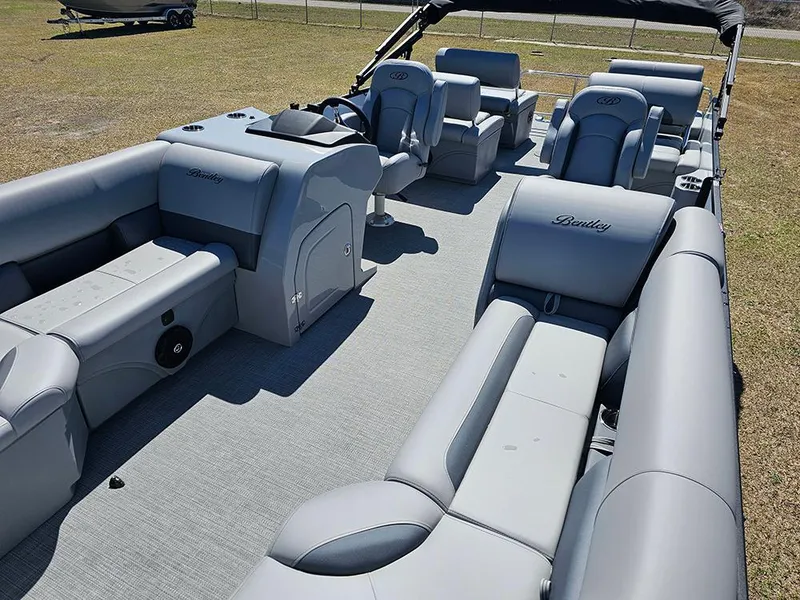 Slide: The Image of 2025 Bentley Pontoons LEGACY 243 QUAD SWINGBACK with spacious seating and modern design. - 11
