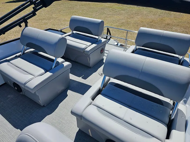 Slide: The Image of 2025 Bentley Pontoons LEGACY 243 QUAD SWINGBACK with luxurious seating arrangement. - 13