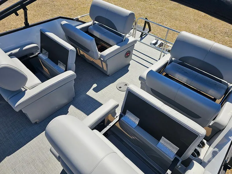 Slide: The Image of 2025 Bentley Pontoons LEGACY 243 QUAD SWINGBACK interior with luxurious seating arrangement. - 15