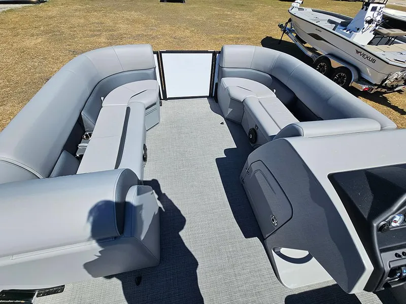 Slide: The Image of 2025 Bentley Pontoons LEGACY 243 QUAD SWINGBACK interior with spacious seating and modern design. - 21