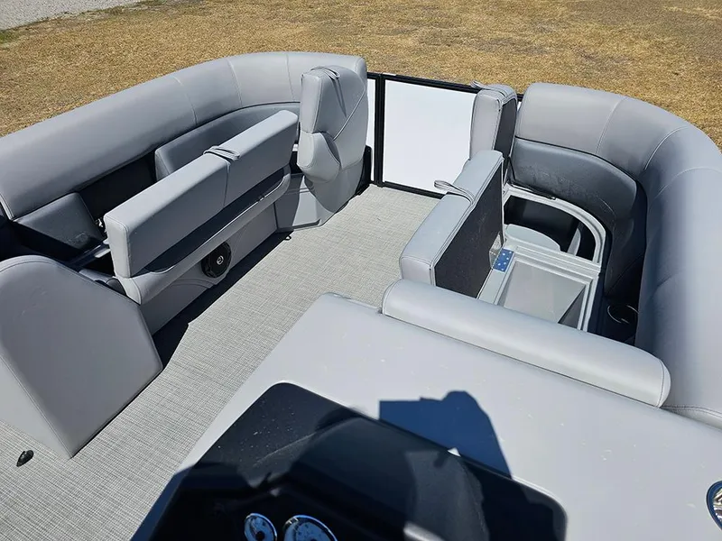 Slide: The Image of 2025 Bentley Pontoons LEGACY 243 QUAD SWINGBACK interior with gray seating and modern design. - 23
