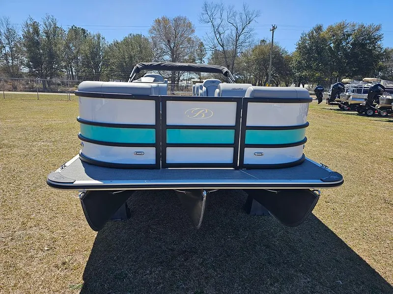 Slide: The Image of 2025 Bentley Pontoons LEGACY 243 QUAD SWINGBACK on grass, rear view. - 4
