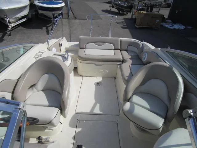 Slide: The Image of 2004 Sea Ray 270 Sundeck interior with spacious seating and elegant design. - 13