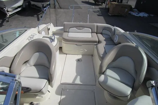 Slide: The Image of 2004 Sea Ray 270 Sundeck interior with spacious seating and elegant design. - 29