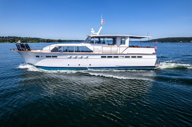 Slide: The Image of 1965 Chris-Craft 57 Constellation yacht cruising on a sunny day. - 2