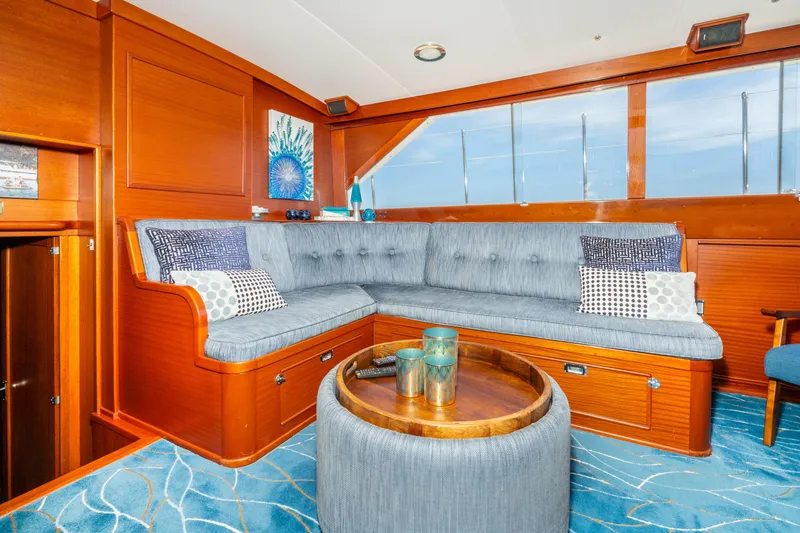 Slide: The Image of Luxurious interior of 1965 Chris-Craft 57 Constellation yacht with elegant seating and decor. - 23