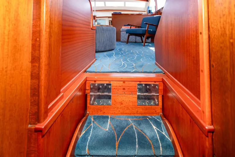 Slide: The Image of Interior of 1965 Chris-Craft 57 Constellation with wooden stairs and blue carpet. - 33