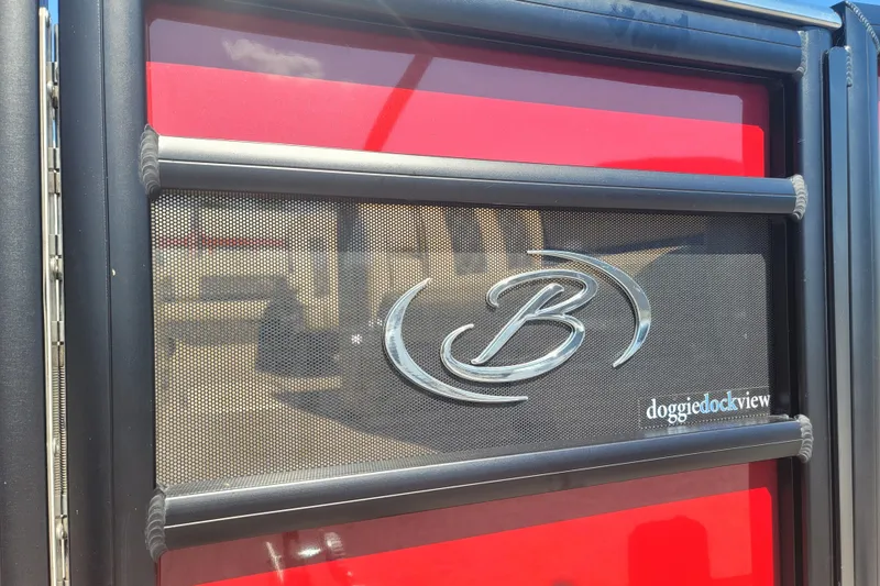 Slide: The Image of 2022 Barletta L23UC boat with red panel and "doggiedockview" feature. - 14