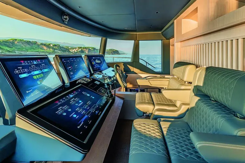 Slide: The Image of Luxurious interior of 2025 Absolute 70 Navetta yacht with advanced navigation systems. - 14