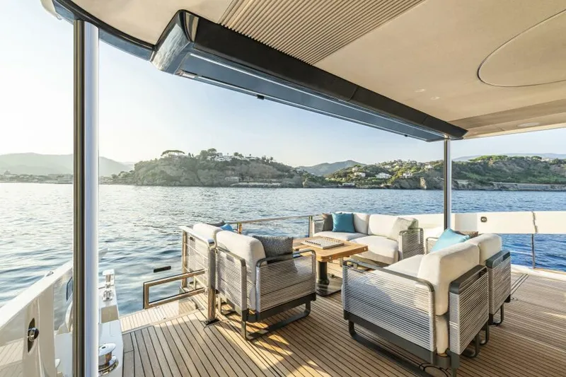 Slide: The Image of Luxurious deck of 2025 Absolute 70 Navetta yacht with scenic ocean view. - 5