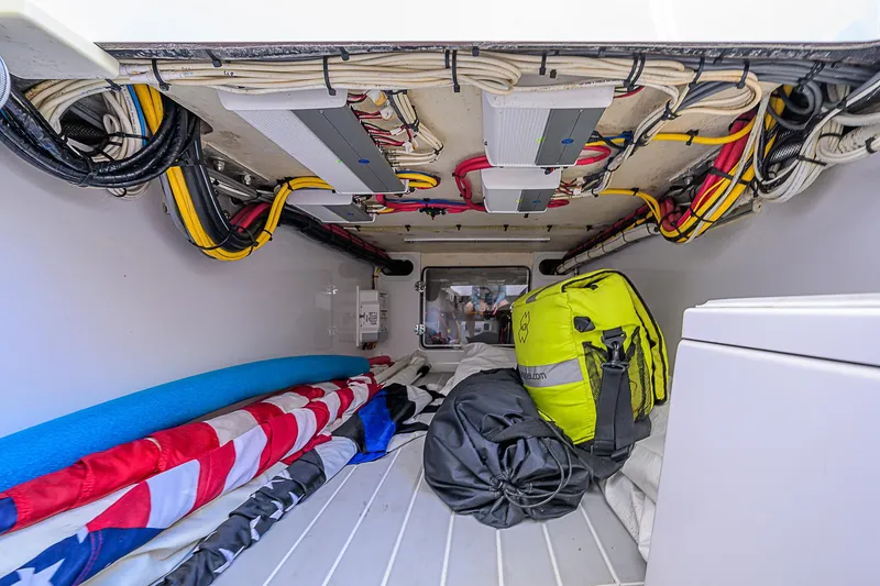 Slide: The Image of Storage compartment of 2017 Bahama 41 boat with gear and equipment. - 25