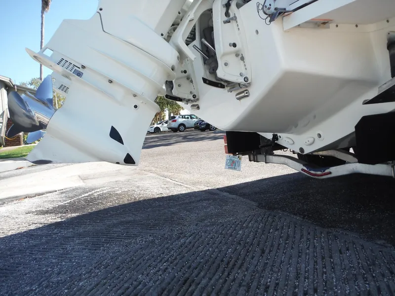 Slide: The Image of 1996 Intrepid 339 Walk Around boat with dual Suzuki outboard motors. - 11