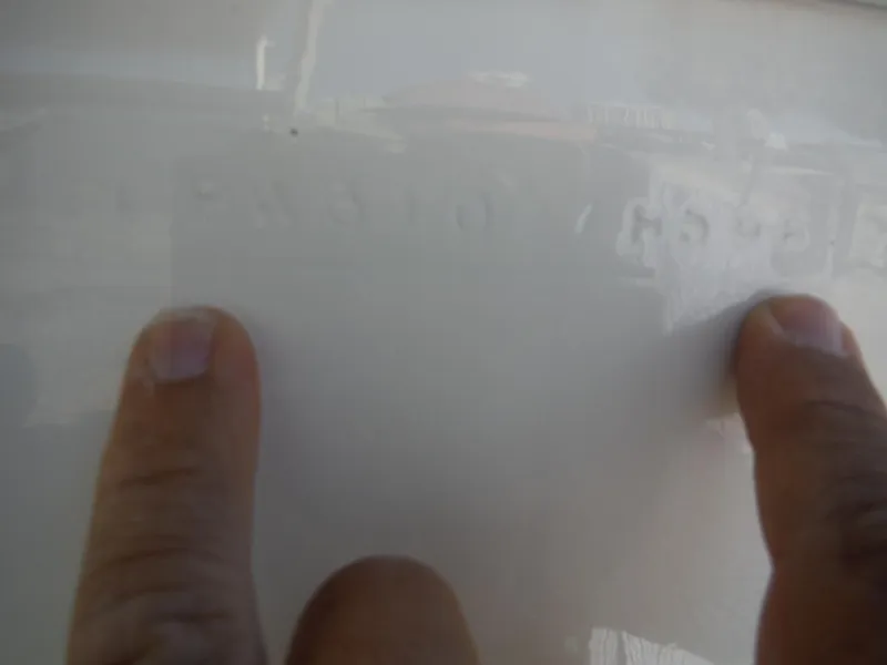 Slide: The Image of Suzuki DF300AP engine label on 1996 Intrepid 339 Walk Around boat. - 15