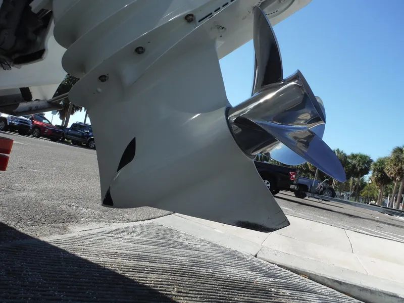 Slide: The Image of 1996 Intrepid 339 Walk Around boat with "Schatzele" name on the side. - 18