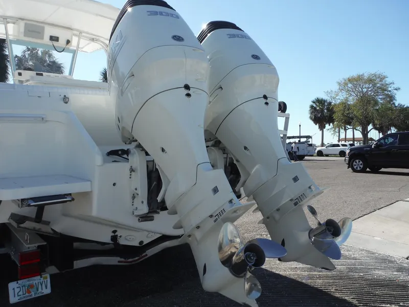 Slide: The Image of Close-up of a 1996 Intrepid 339 Walk Around boat propeller on a sunny day. - 20
