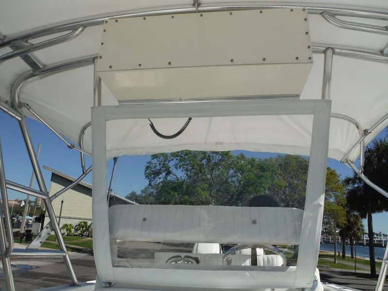 Slide: The Image of Black refrigerator inside a 1996 Intrepid 339 Walk Around boat. - 42