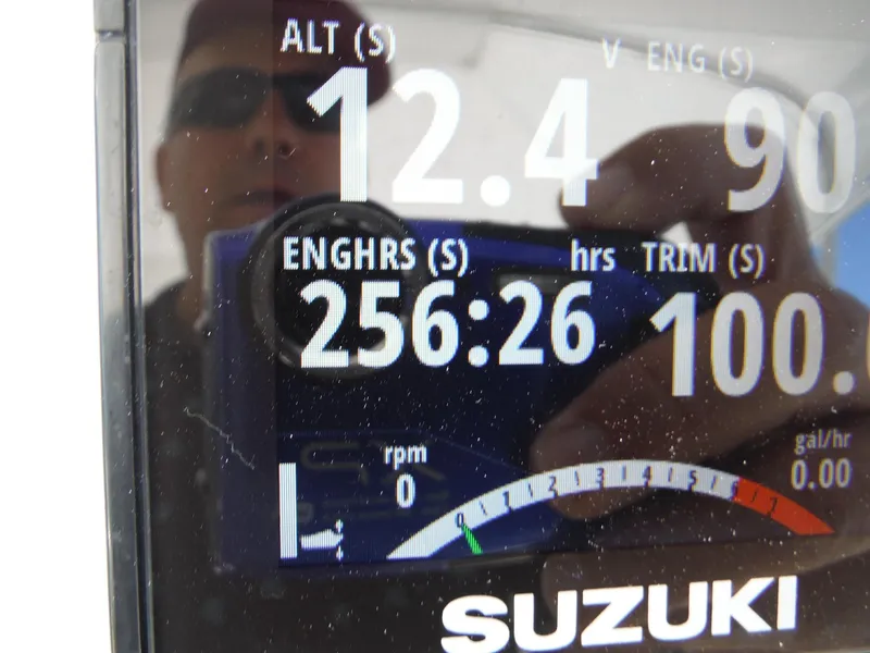 Slide: The Image of Close-up of engine hours display on 1996 Intrepid 339 Walk Around boat. - 47