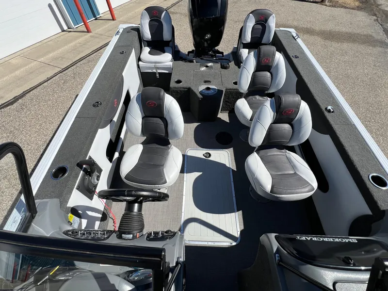 Slide: The Image of 2017 Smoker Craft 172 Ultima Fish n Ski boat interior with seating and steering console. - 1