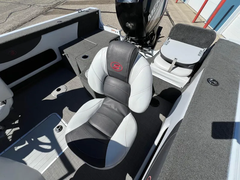 Slide: The Image of 2017 Smoker Craft 172 Ultima Fish n Ski boat interior with seating and motor. - 12