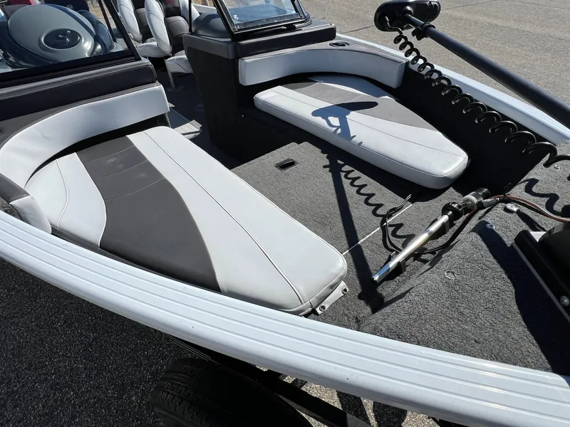 Slide: The Image of 2017 Smoker Craft 172 Ultima Fish n Ski interior with seating and fishing equipment. - 17