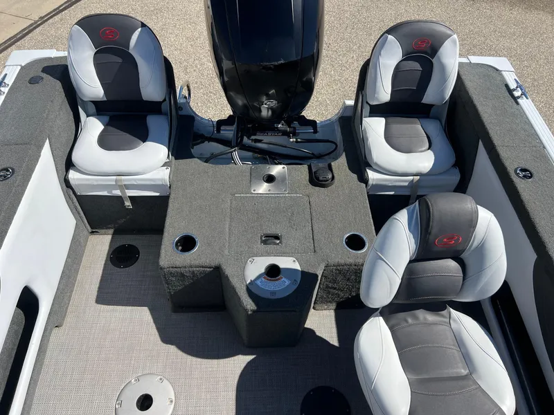 Slide: The Image of 2017 Smoker Craft 172 Ultima Fish n Ski boat interior with four seats and motor. - 20