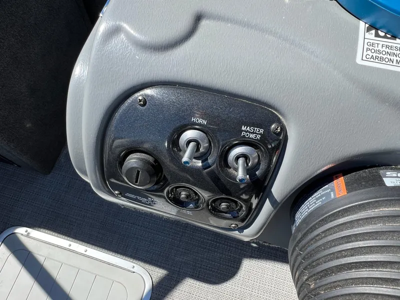 Slide: The Image of Control panel of 2017 Smoker Craft 172 Ultima Fish n Ski boat, featuring switches and dials. - 32