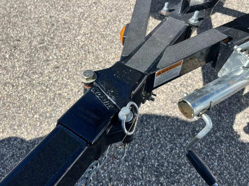 Slide: The Image of Trailer hitch of 2017 Smoker Craft 172 Ultima Fish n Ski on asphalt surface. - 6
