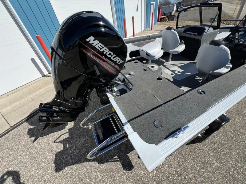 Slide: The Image of 2017 Smoker Craft 172 Ultima Fish n Ski boat with Mercury outboard motor, docked outdoors. - 7