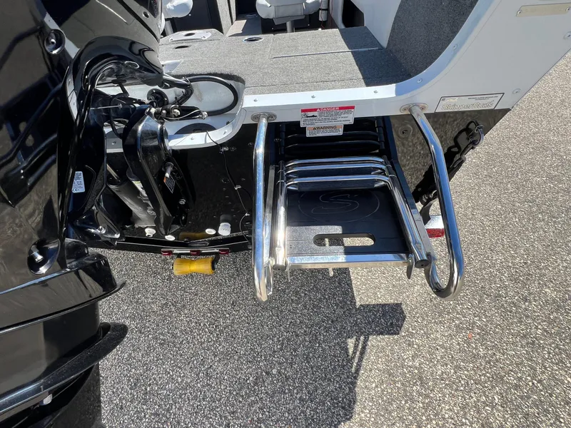 Slide: The Image of 2017 Smoker Craft 172 Ultima Fish n Ski boat with a stainless steel swim ladder. - 9