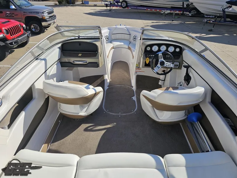 Slide: The Image of Interior of 2007 Four Winns 210 Horizon boat with seating and dashboard. - 38