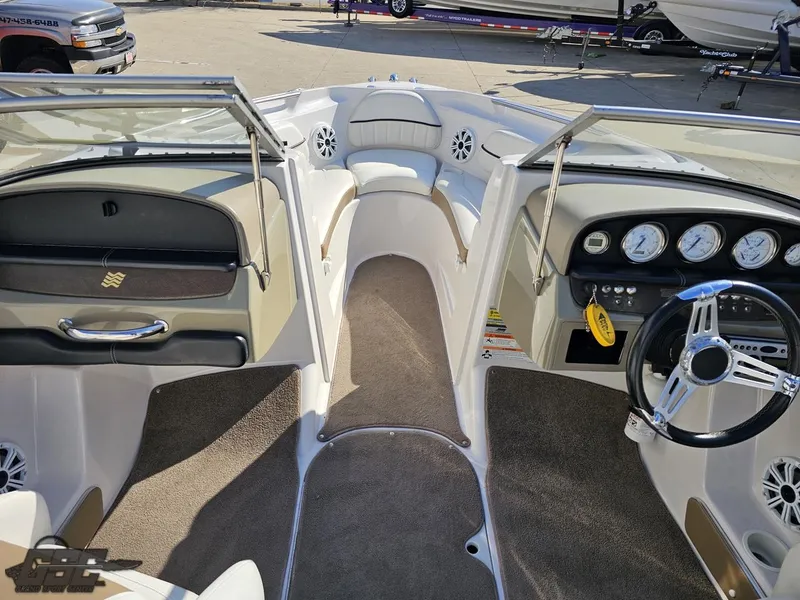 Slide: The Image of 2007 Four Winns 210 Horizon boat interior with steering wheel and dashboard. - 42